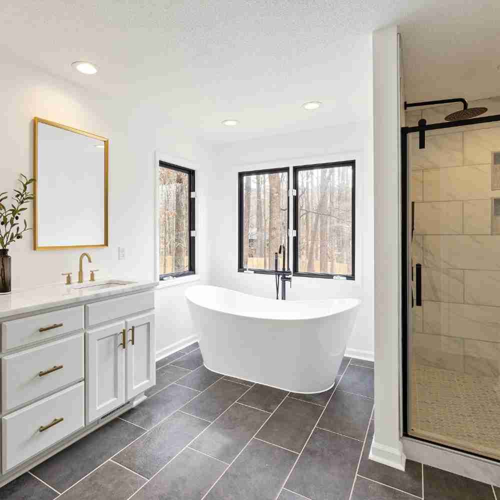 Illustrative modern bathroom with a freestanding bath and walk-in shower