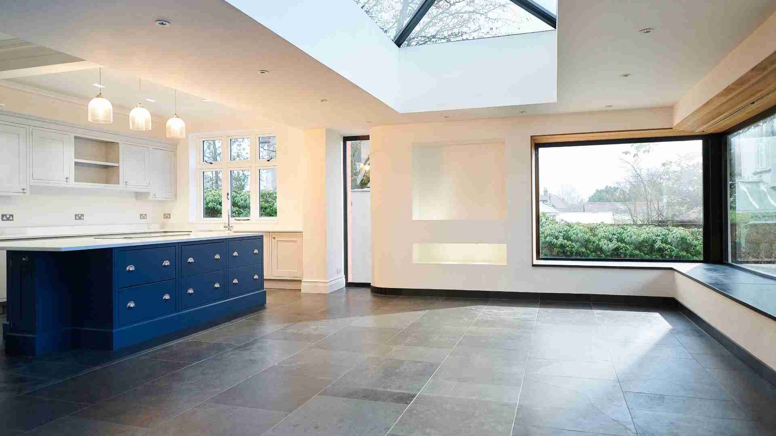 Illustrative finished kitchen extension with rooflight and large glazing